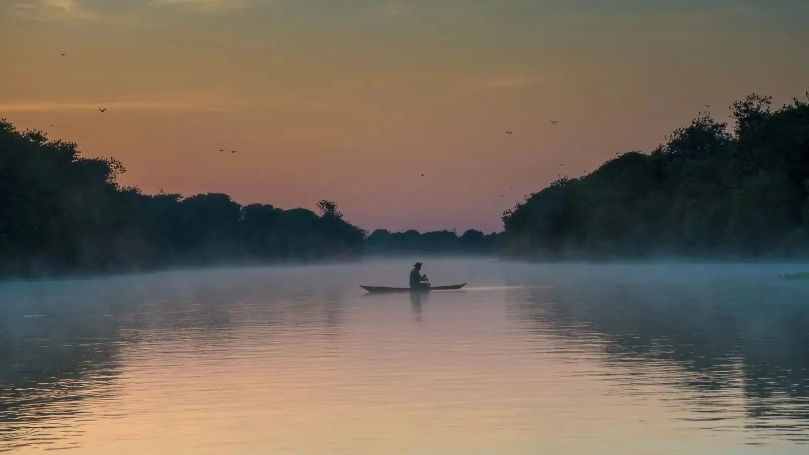 Rio Madeira, entardecer com canoa